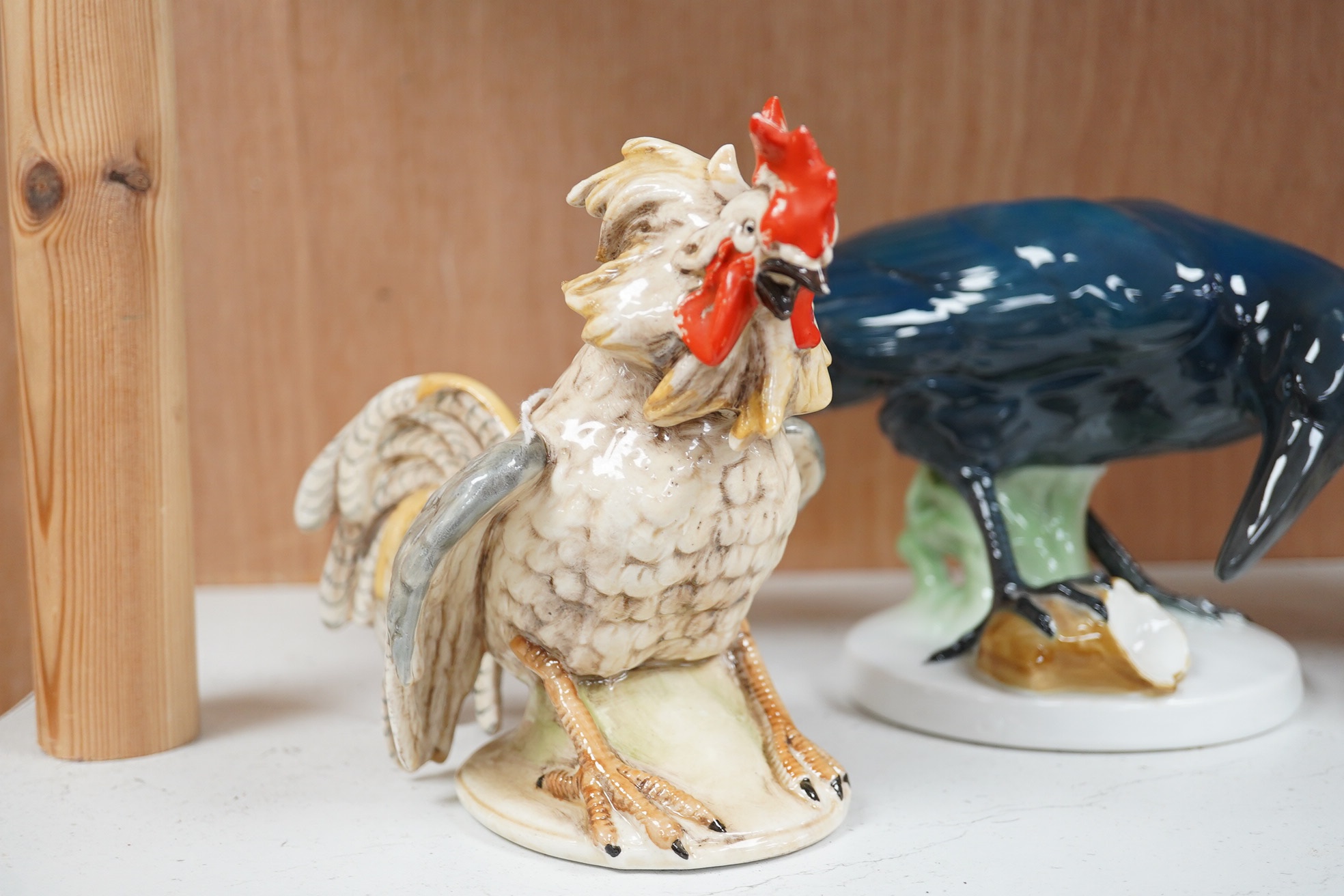 A large Beswick grey parrot, two chickens and a blackbird, parrot 29cm high. Condition - chickens glazing worn